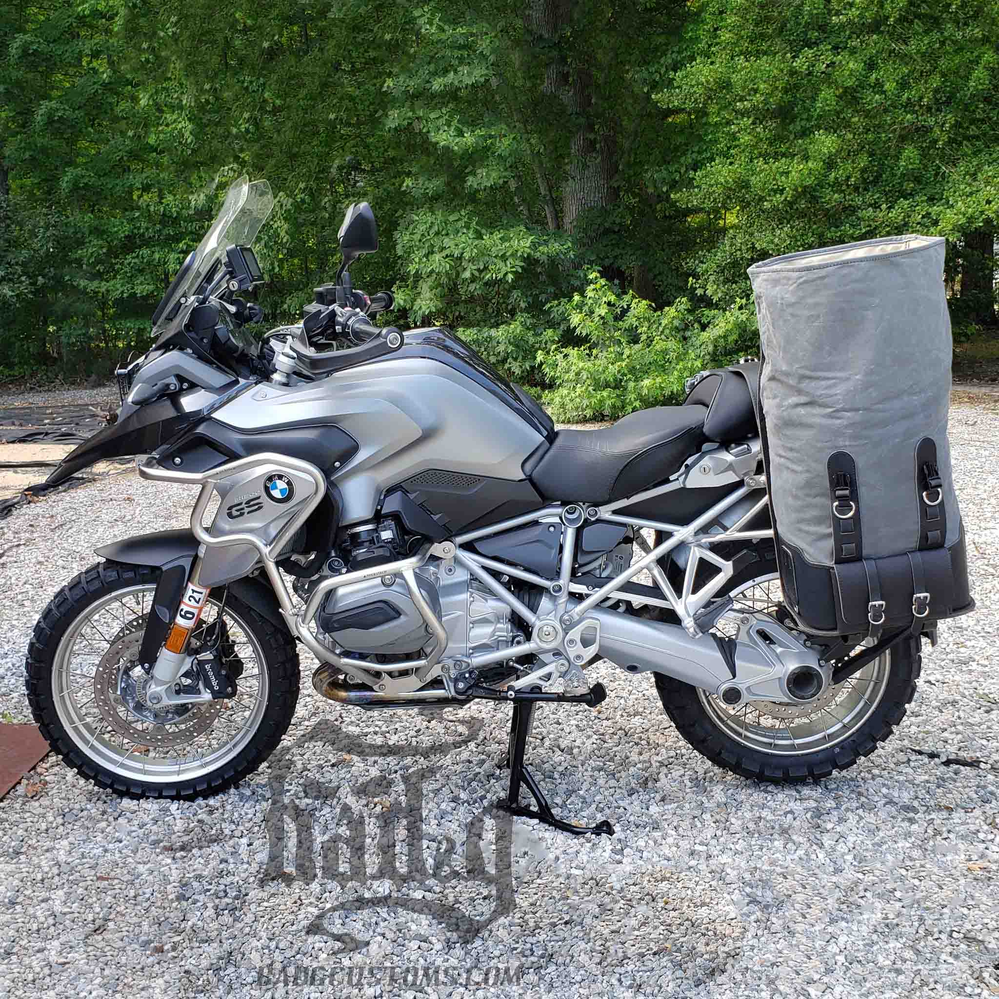 Upgrade your ride with the URB10 Rolltop Saddlebags. Unique design enables quick conversion from saddlebag to backpack. Hand crafted in USA with premium veg tan water buffalo leather, waxed canvas and stainless steel hardware. Durable and stylish, they are the perfect fit for your motorcycle.